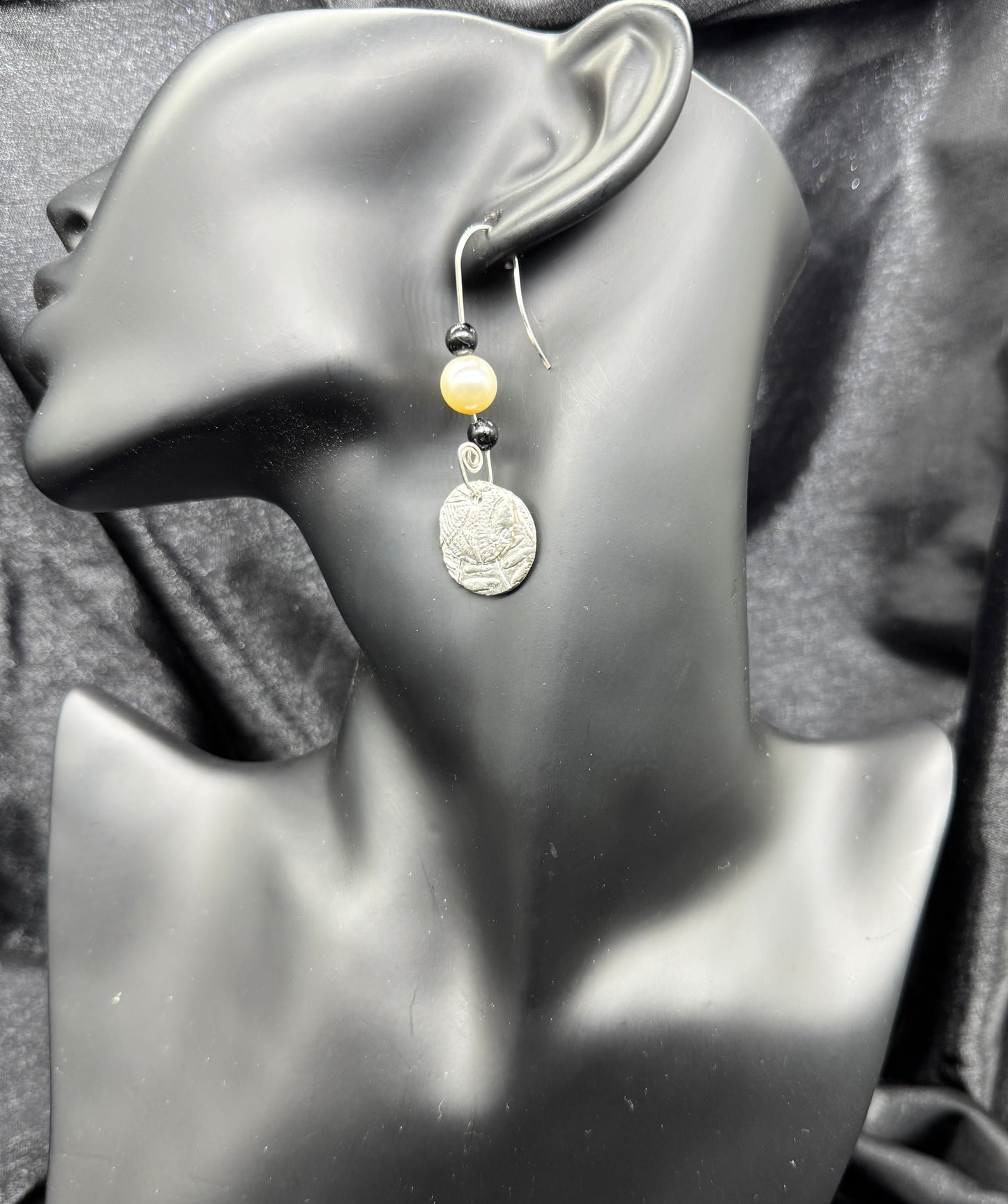 Black and pearl earrings