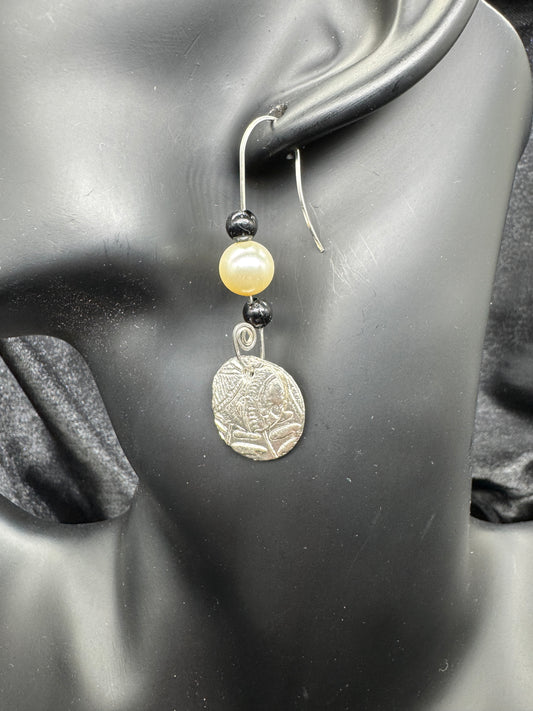 Black and pearl earrings
