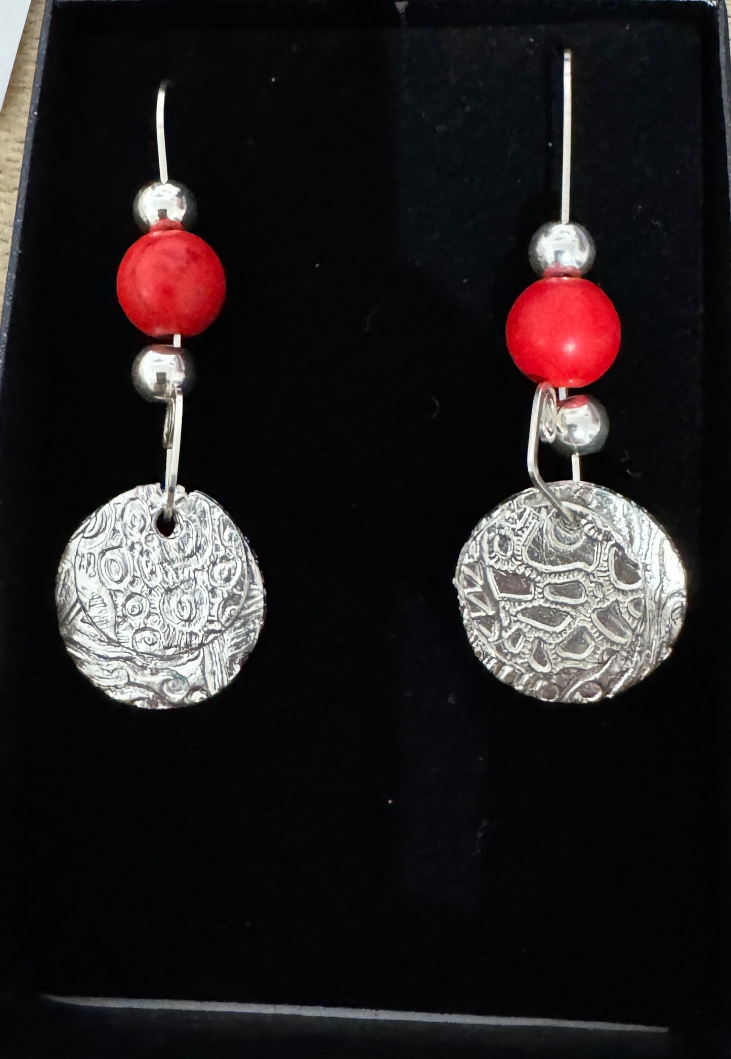 Red and silver earrings