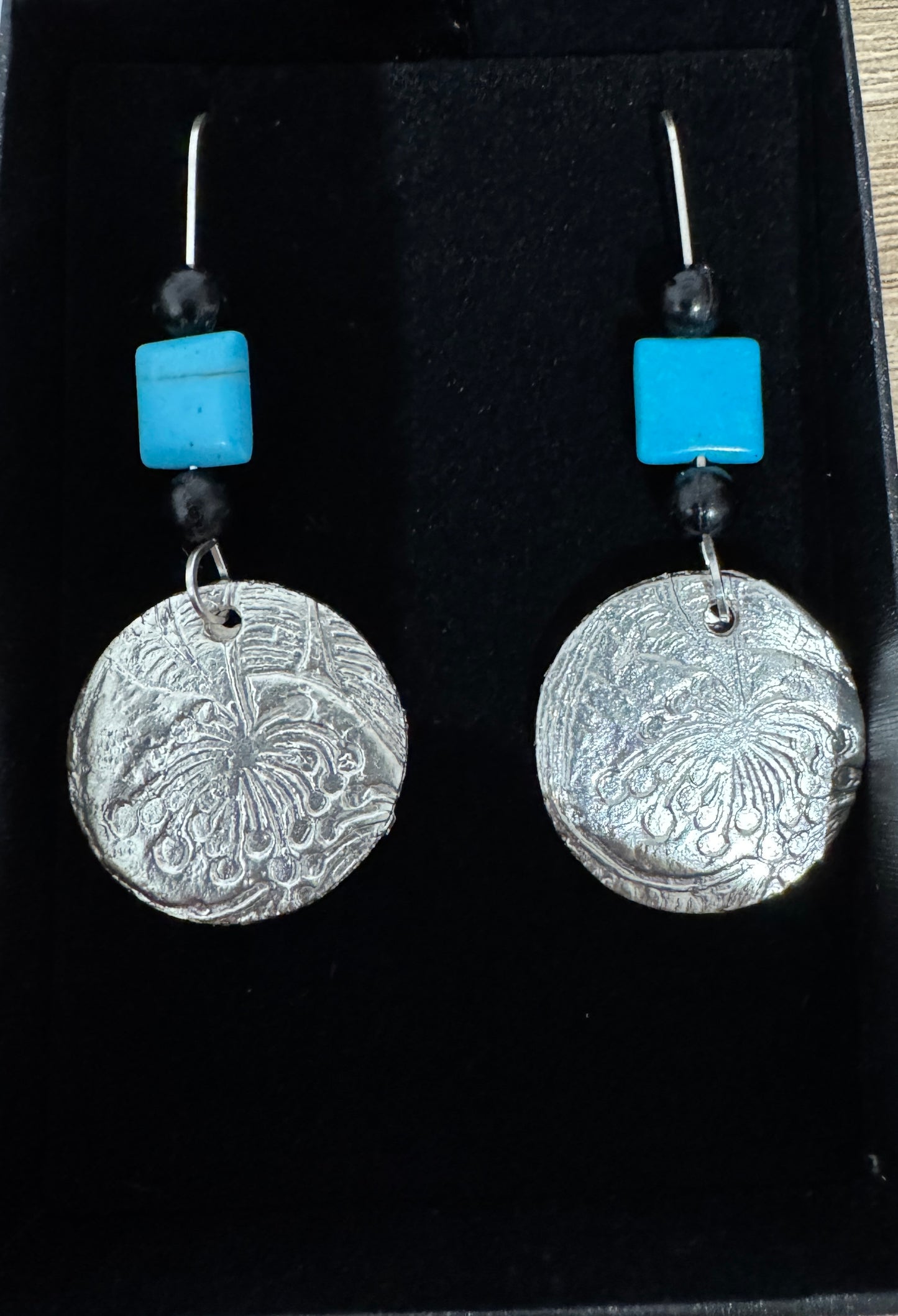 Blue and black earrings